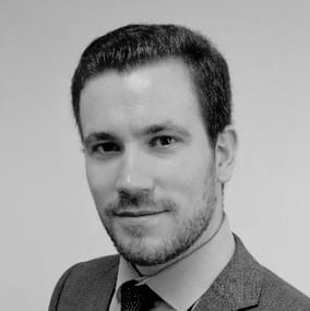 Head shot of Adam Riches, Senior Managing Director (Global)