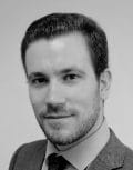 Head shot of Adam Riches, Senior Managing Director (Global)